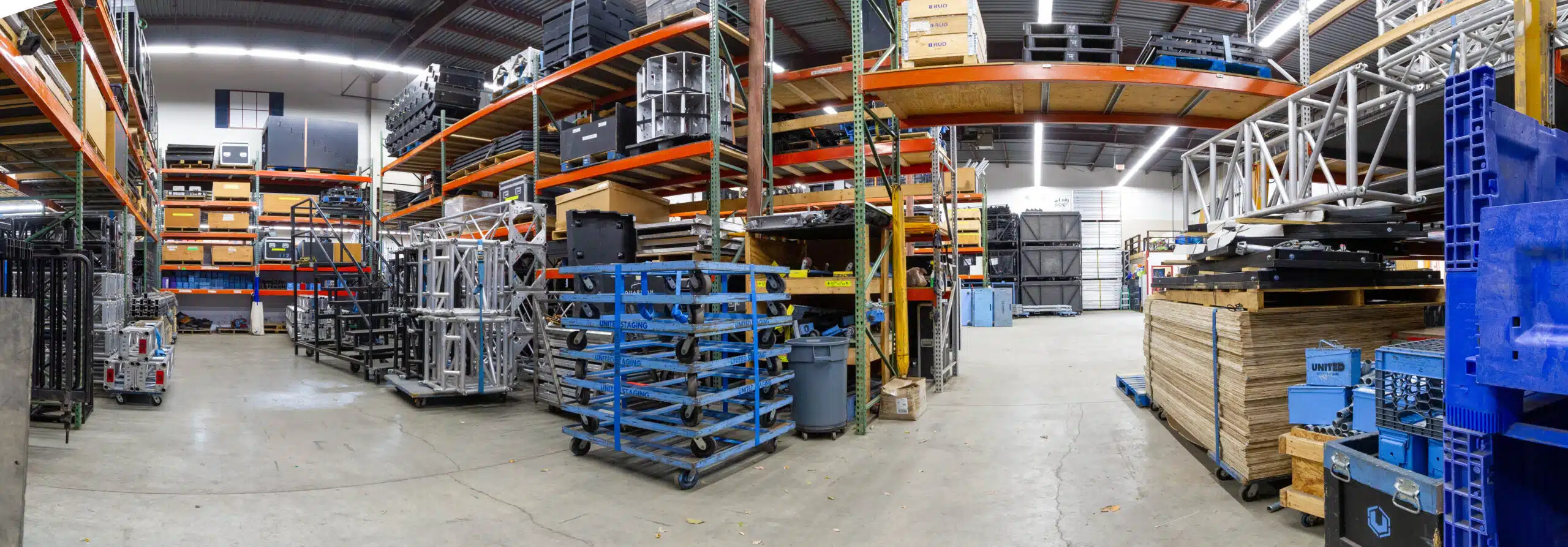 Panorama of the inside of the United Staging & Rigging Haverhill warehouse. 2022. Taken in the summer when most of the gear was out on job sites. Clean warehouse.