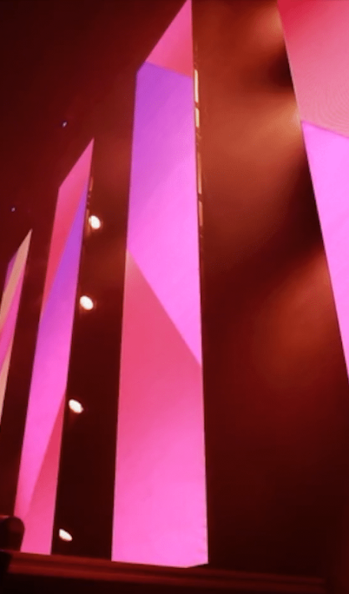 Salmon pink video wall still shot from an automation promo video