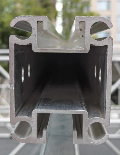 End view of UNI-KEDER, that shows off the four corner keder rails and the opposing strut channels on top and bottom